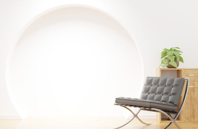 Coin salon contemporain épuré où un diffuseur de parfum design en aluminium trouve naturellement sa place