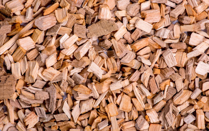Gros plan de copeaux de bois, illustration de l'article sur un diffuseur qui ne fait plus de brume
